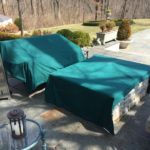 tarped loveseat&fireplace